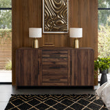 wood sideboard cabinet with drawers, cabinets is placed against  wooden wall, topped with2 lamps, books.