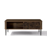 Mid-century modern wood coffee table an open storage shelf on the left, a textured patterned sliding door on the right.