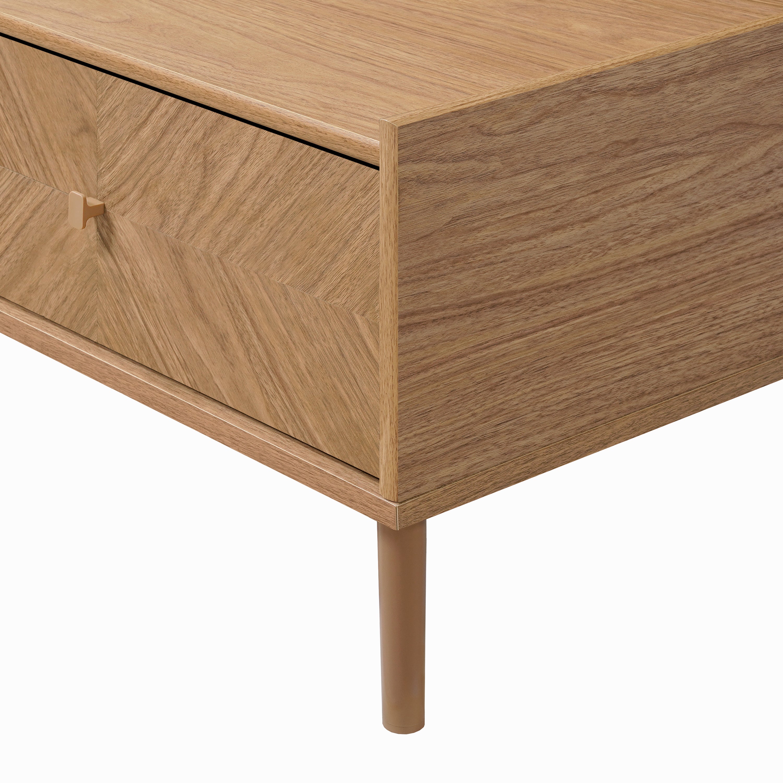 Close-up view of a wood coffee table with storage, featuring a drawer, angled corner detail, cylindrical metal leg.