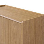 Modern wood storage cabinet with a smooth finish and rounded edges, showing the light oak top and side panels.