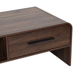 Close-up of a wooden coffee table with a dark finish, featuring a black handle on the drawer.