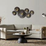 a-living-room-with-a-sofa-coffee-table-and-wall-art