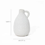 This white speckled ceramic jug, reminiscent of a vintage vase, features a handle and measures 6.89 inches in height and 5.71 inches in diameter, making it an ideal piece for home decor.