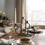 candle-holder-and-wine-glasses-on-a-dining-table