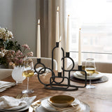 candle-holder-and-wine-glasses-on-a-dining-table
