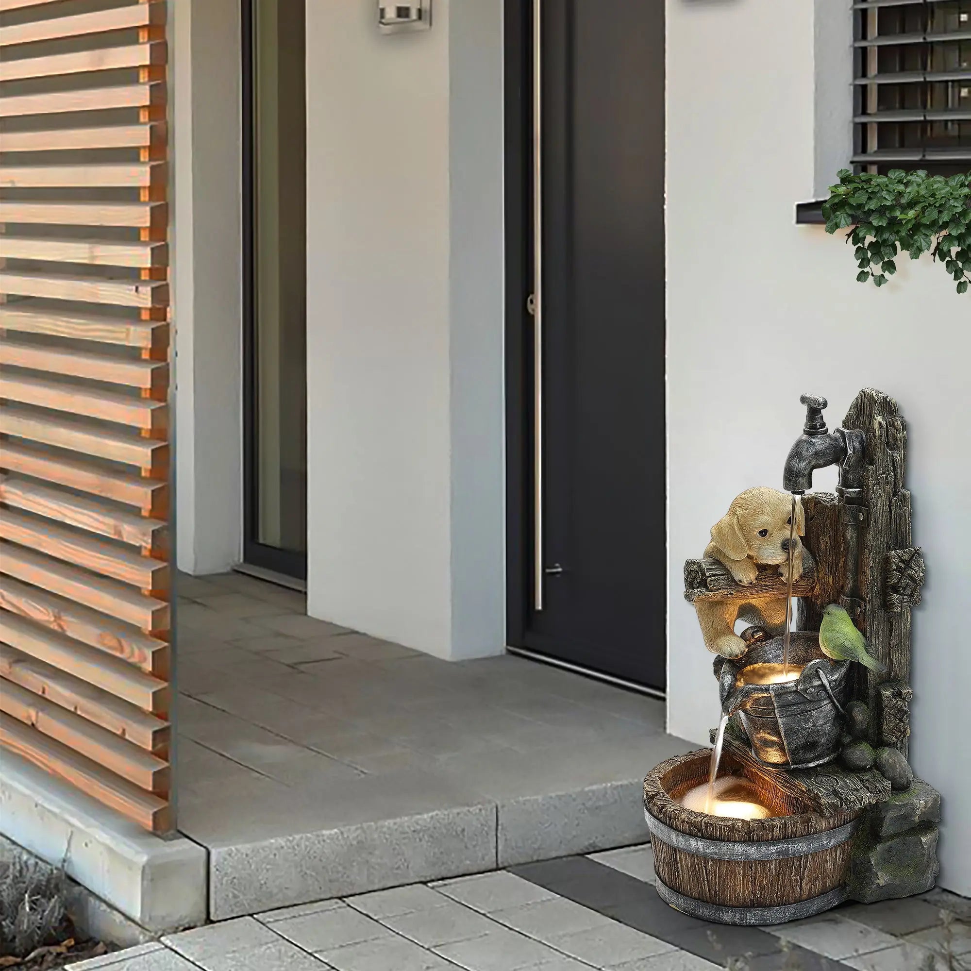 farmhouse style water fountain by the entrance of an apartment