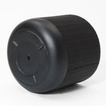 Black, cylindrical industrial air spring with a ribbed texture and a subtle stripes pattern on a white background.