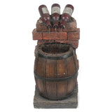rustic-fountain-with-three-wine-bottles-pouring-into-a-wine-barrel