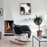 modern-style-gold-and-black-metal-frame-wall-mirror-in-living-room