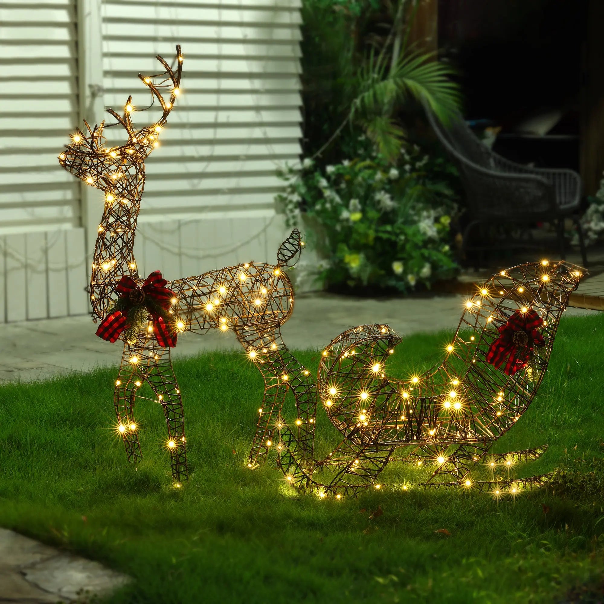 beautiful-reindeer-and-sleigh-lighted-holiday-decoration-for-outdoors-front-yard