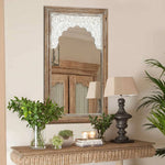 farmhouse-style-accent-wall-mirror-with-an-intricate-hand-carved-top