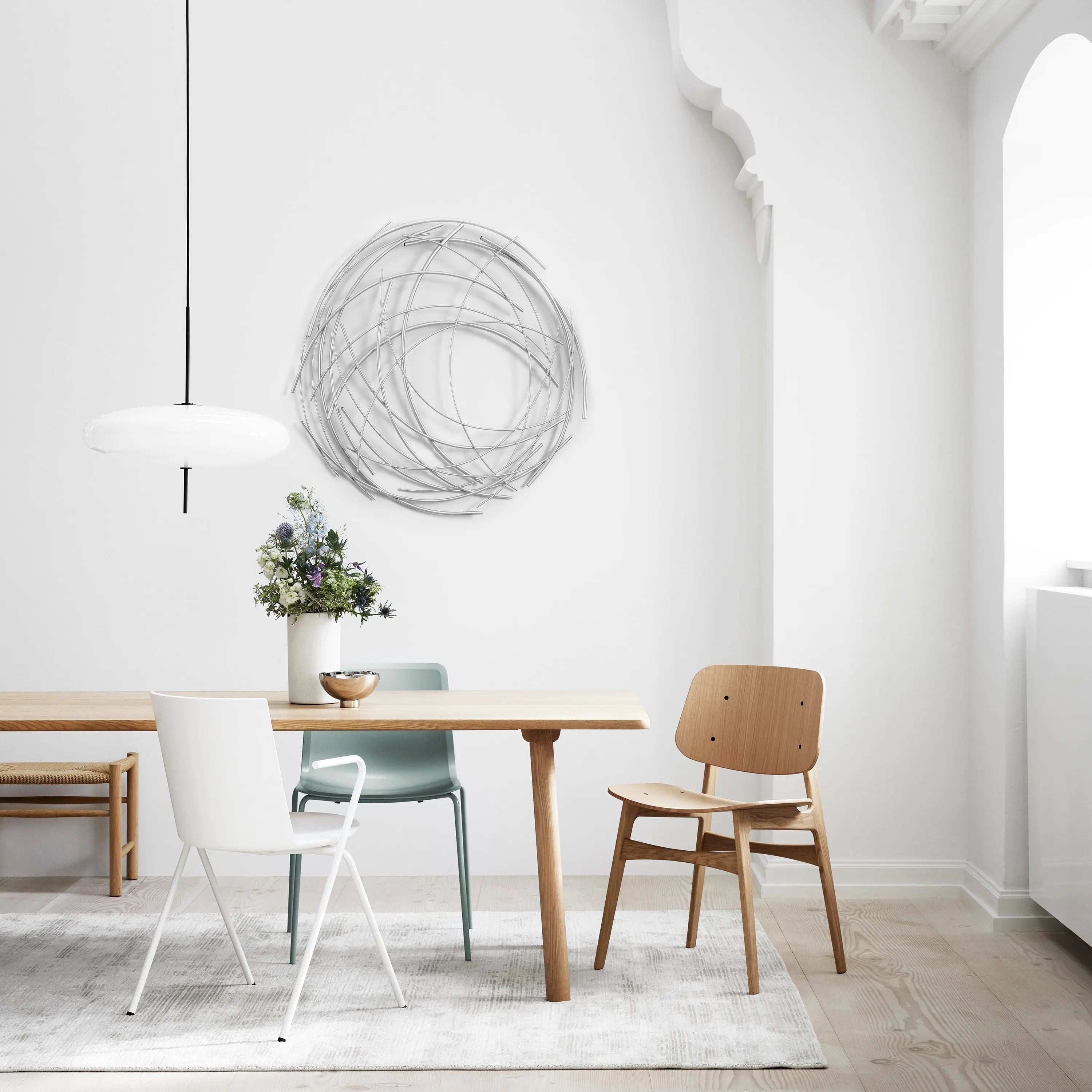 silver metal abstract swirl round wall decor