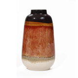 A vintage ceramic vase with a glossy black top transitions elegantly into earthy brown and beige tones, showcasing a color block gradient against a white background, perfect for home decor.