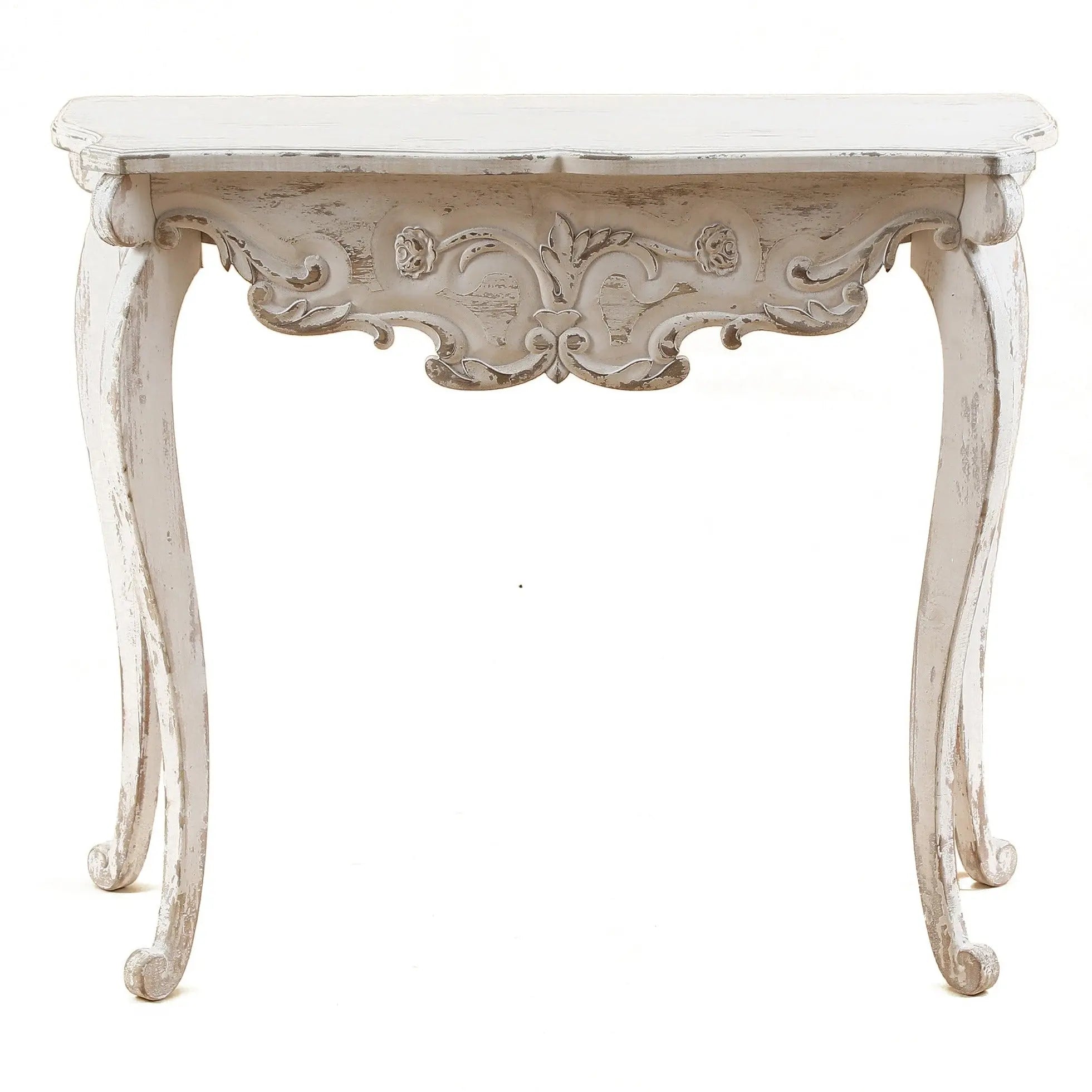 White Victorian-style console table with ornate carved details and curved legs, featuring a distressed off white finish for a charming shabby chic look.