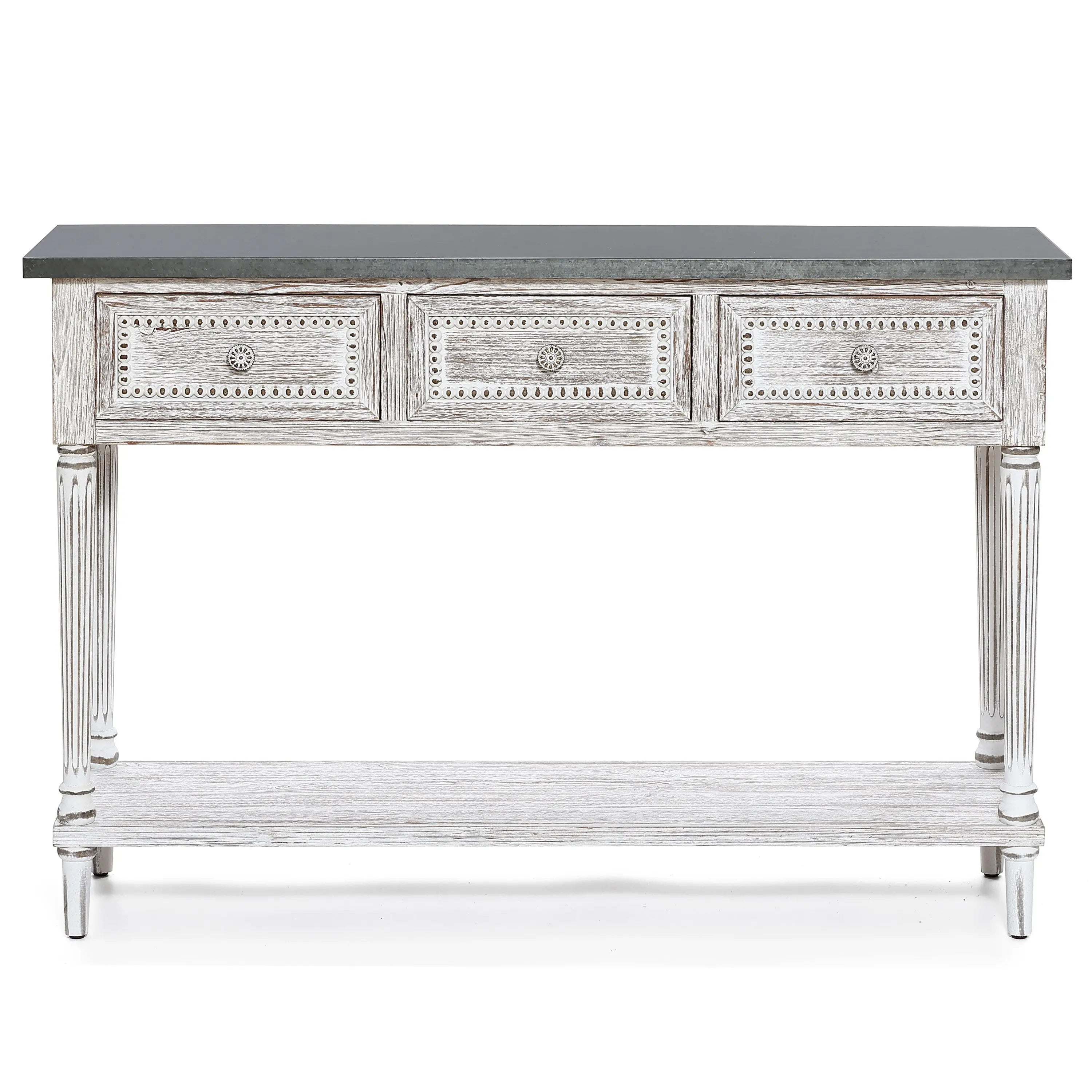A farmhouse-inspired table featuring a dark top, three front drawers with decorative knobs, carved details, and a lower shelf, all finished in distressed white—perfect as a stylish storage console table for any home.