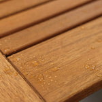 wooden-bench-with-water-droplets-on-it