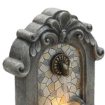 white-and-yellow-mosaic-tile-design-on-wall-fountain-with-spout 