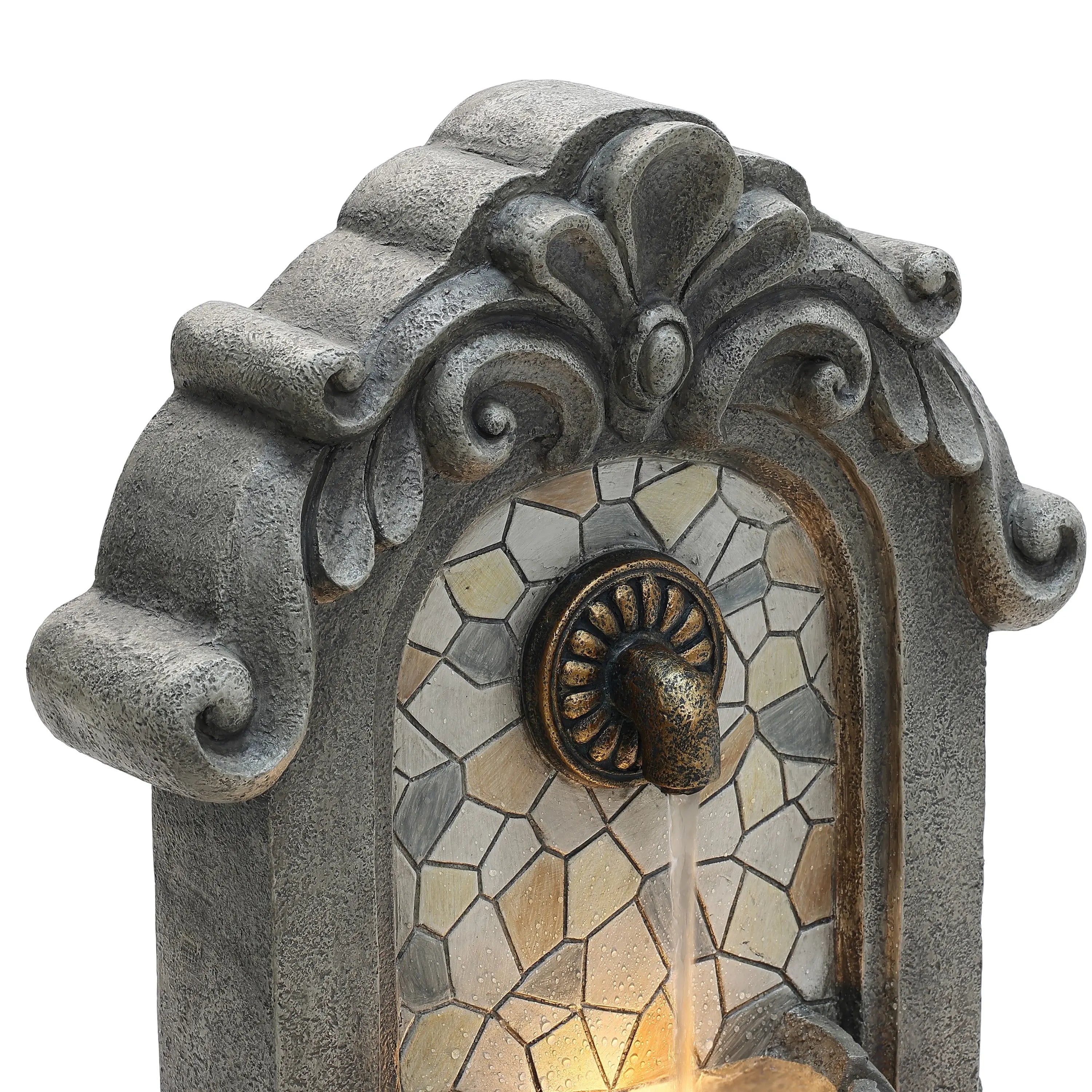 white-and-yellow-mosaic-tile-design-on-wall-fountain-with-spout 