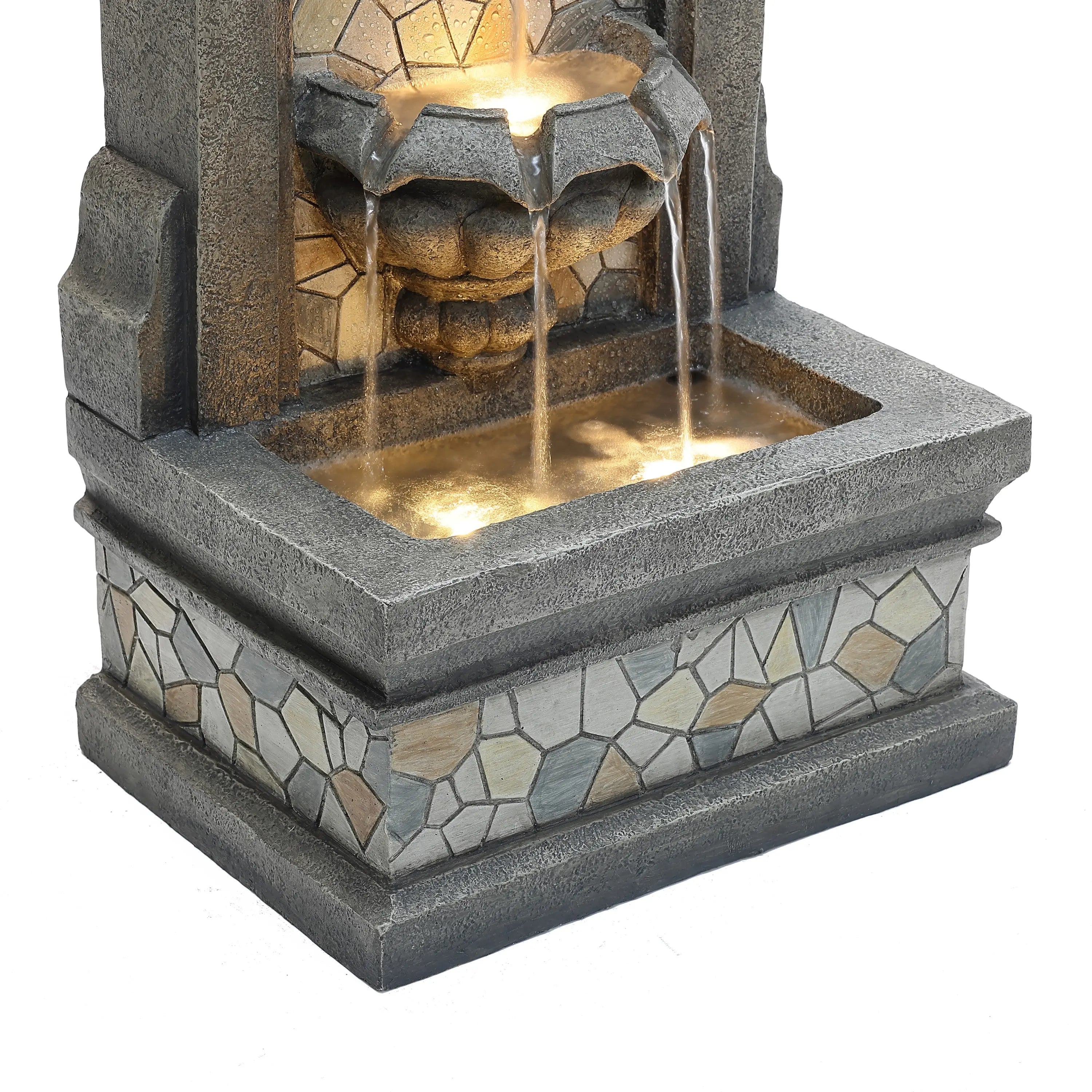 wavy-shaped-basin-for-flowing-water-on-fountain-with-lights