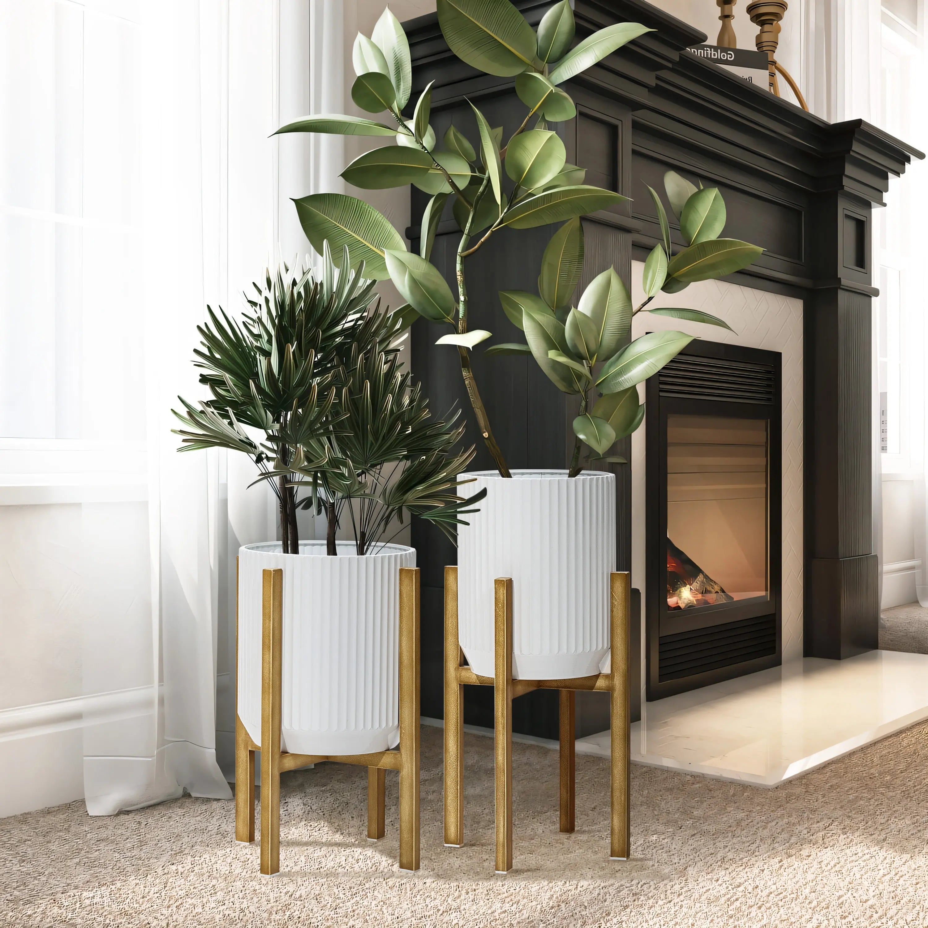 Two modern metal plant pots on wooden stands are placed on a carpeted floor near a dark fireplace in a bright room.