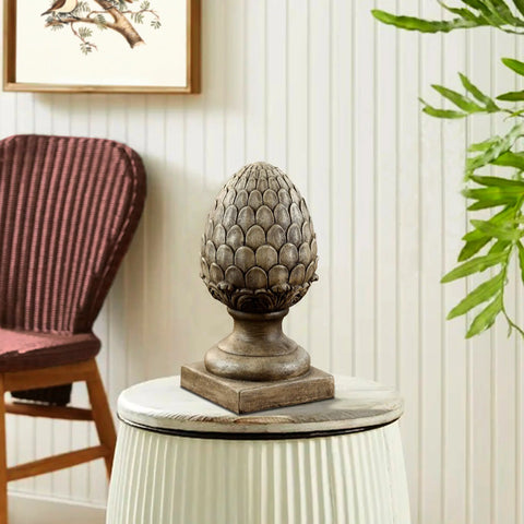 Artichoke finial statue