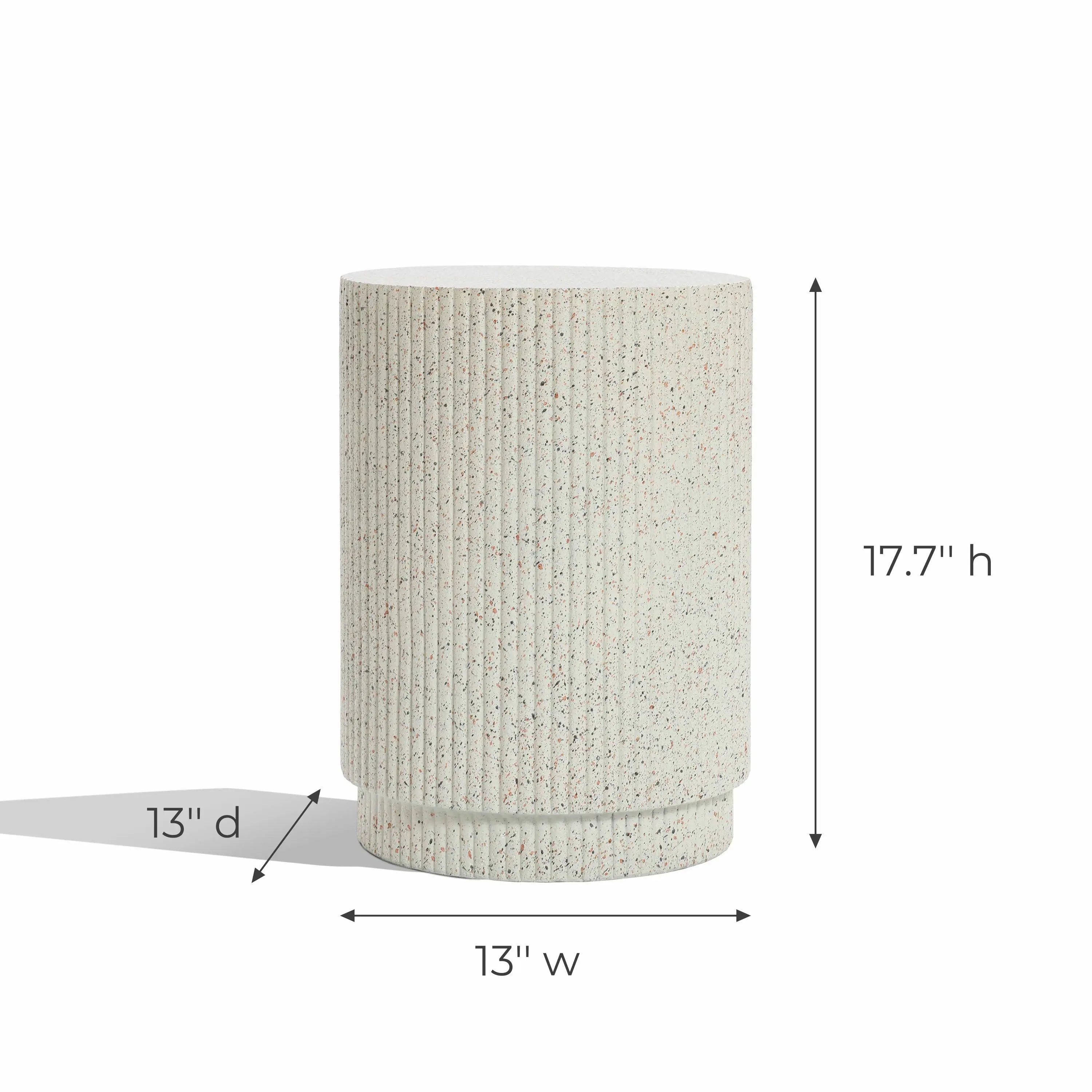 This cylindrical speckled stool, crafted from cement material, stands 17.7 inches high and 13 inches wide. Its textured surface and ivory white color make it a versatile side table addition to any space.