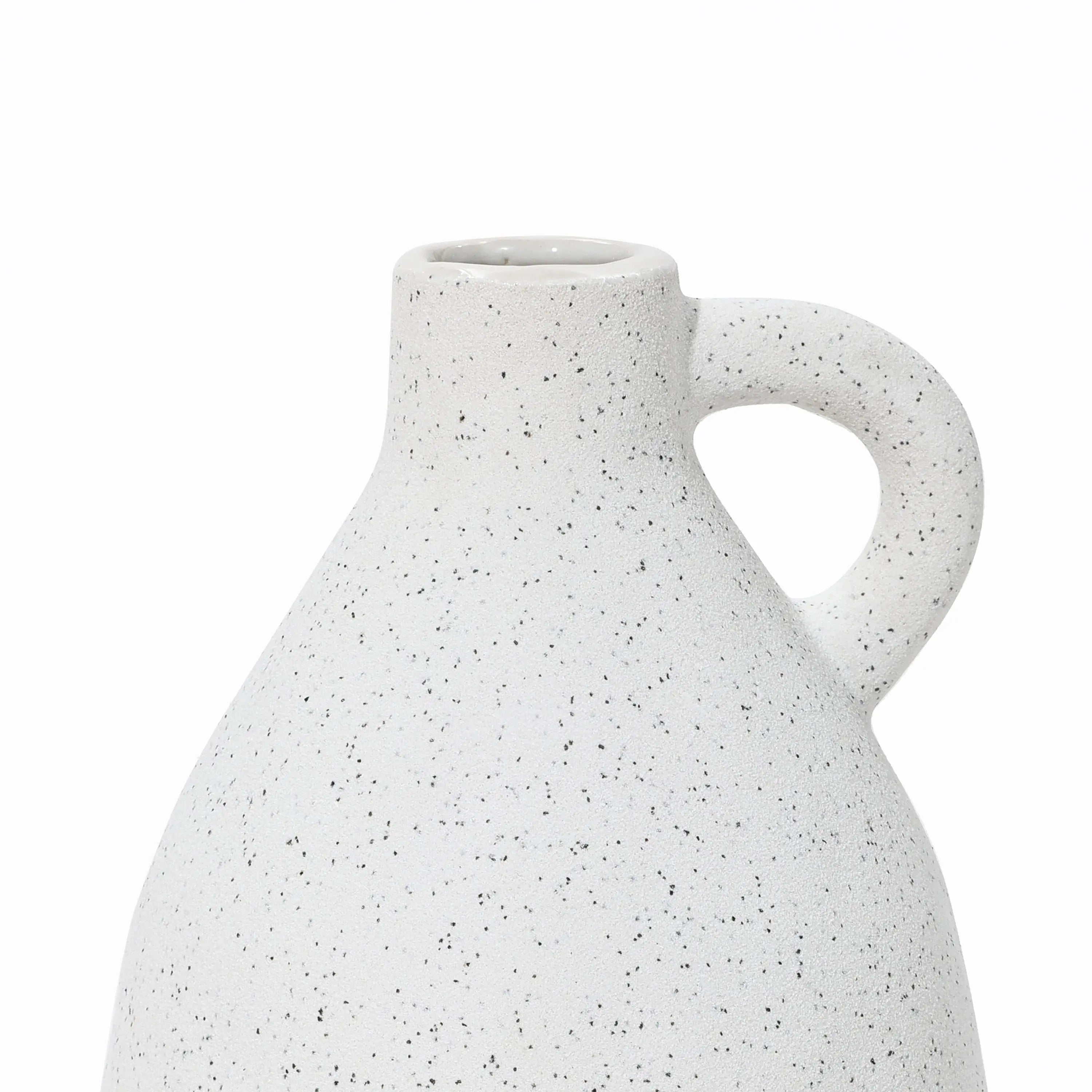 Close-up of a speckled white ceramic vase with a rounded body and a single curved handle on a white background. This vintage vase brings an elegant touch to any home decor, offering timeless charm and style.