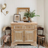distressed-wood-storage-cabinet-with-doors-and-drawers-creates-a-rustic-feel