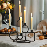 black-candelabra-and-candles-on-a-dining-table
