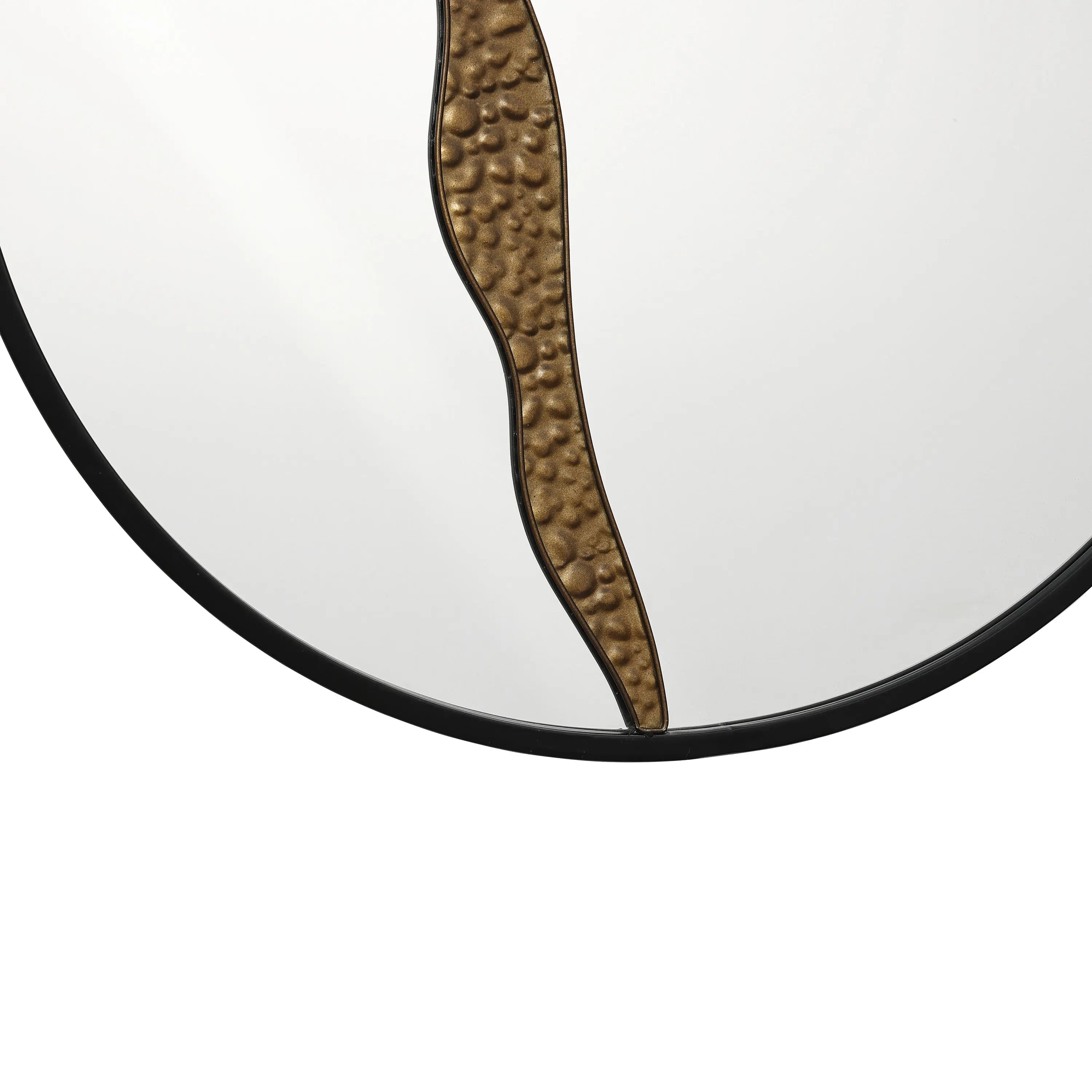 Close-up of a round wall mirror featuring an artistic design with a wavy bronze textured pattern running vertically down the center. The frame is black, offering a sleek touch to this modern decoration.