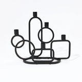 black-candle-holder-with-five-circles