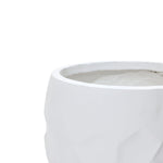 White, faceted geometric pot planter made from durable magnesium oxide material, suitable for both indoor and outdoor use, against a plain background.