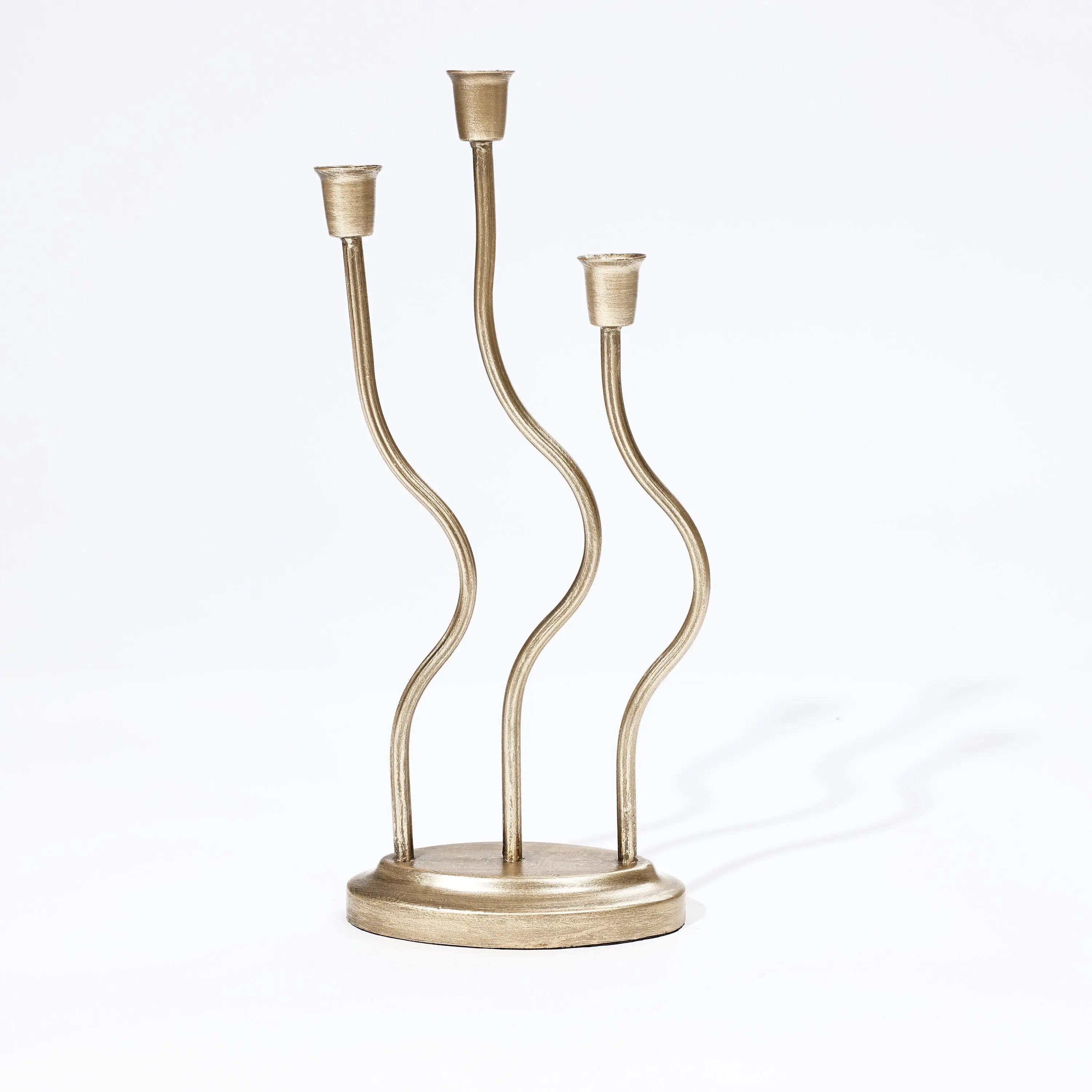 An elegant candle holder with three wavy, vertical stems rises gracefully from the round base, embodying a sophisticated touch of home decor artistry against a white background.