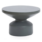 Contemporary round coffee table featuring a modern gray finish, with a wide, flat top and sculptural, tapered pedestal base crafted from durable magnesium oxide material.