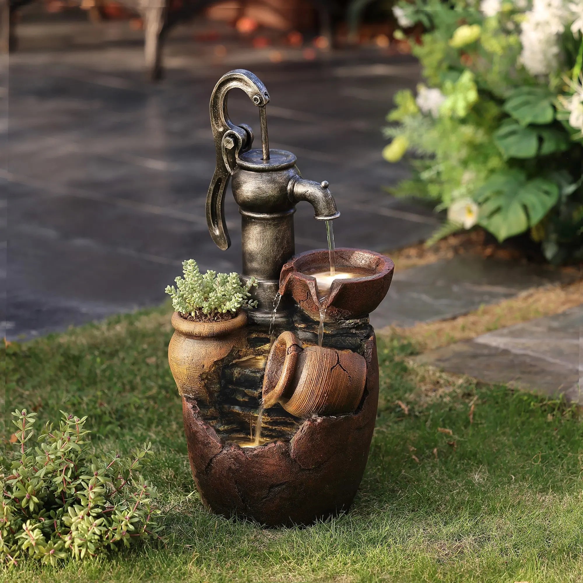 beautiful-farmhouse-outdoor-fountain-featuring-a-water-pump-and-stacked-pots-with-led-lights