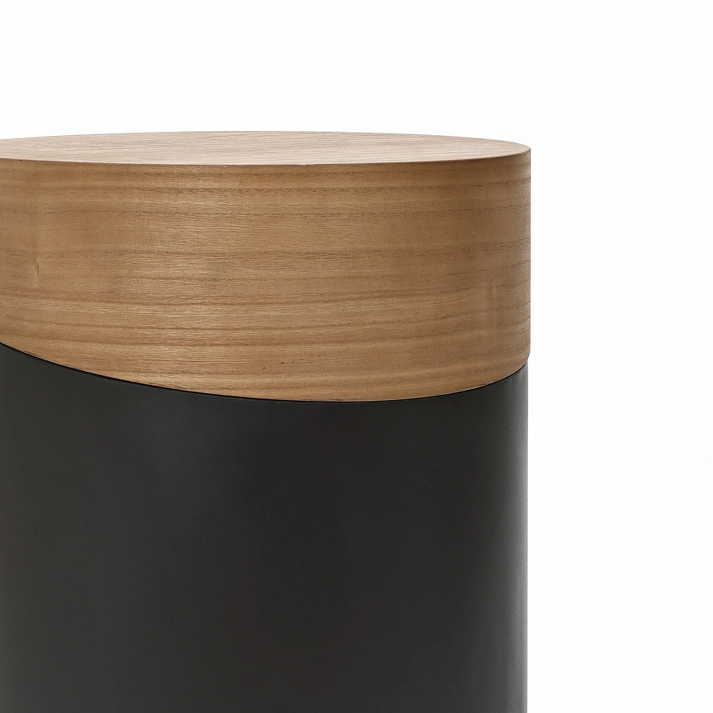Close-up of a versatile piece with a wooden top and dark-colored cylindrical body on a white background, perfect as a decorative side table.