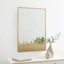 mirror-and-vase-on-a-white-sideboard