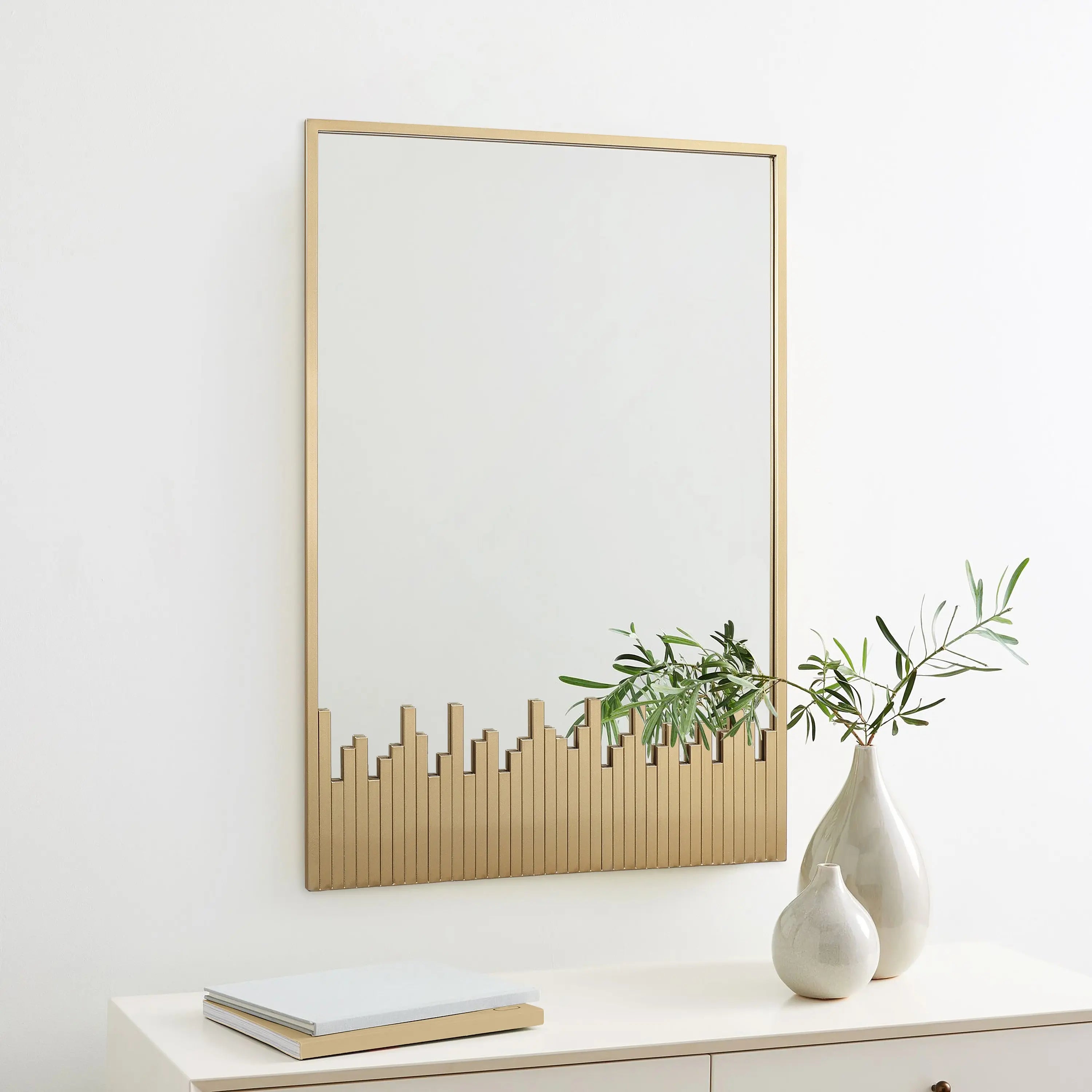 mirror-and-vase-on-a-white-sideboard