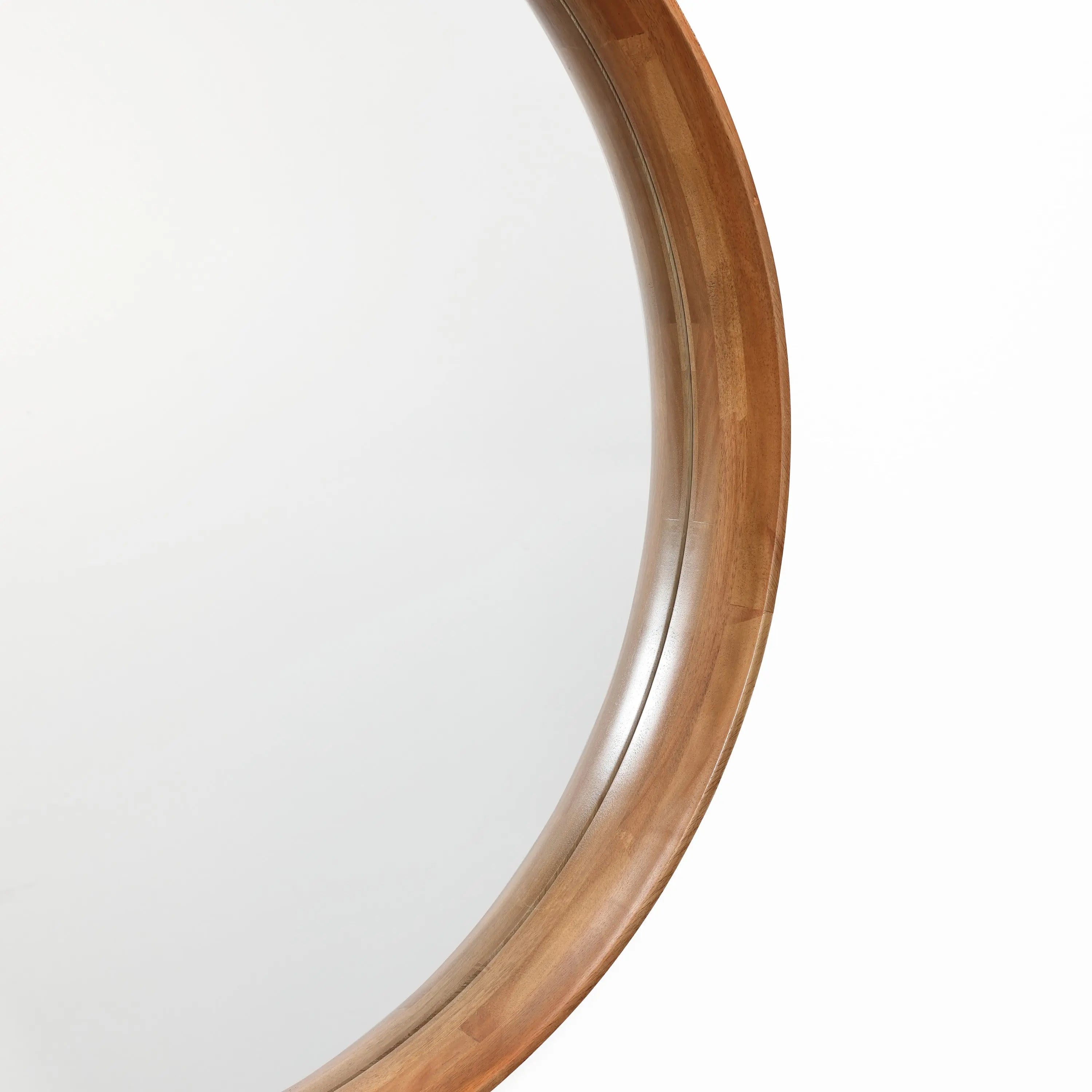 Close-up view of a wooden round wall mirror with a natural wood finish against a white background.