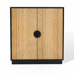 A wooden cabinet with a contemporary design features natural bamboo strips and a geometric pattern on the doors, complemented by sleek black edges. The two doors have a round black handle in the center, creating a sophisticated blend of style and function.