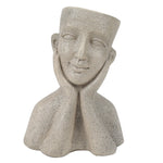 A decorative statue, this stone bust planter features a human head resting on both hands, with the top of the head open to form a unique container.