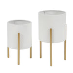LuxenHome presents a contemporary set of two white metal indoor planters, each with a textured surface and elevated on three gold legs. The set includes one larger planter for a striking modern display when placed together.