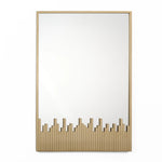 rectangular-mirror-with-a-gold-frame-and-a-city-skyline-etched-into-the-mirror