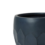 Close-up of a dark gray, round ceramic planter featuring a textured geometric pattern on the exterior, perfect for indoor and outdoor use.