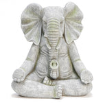 stone-statue-of-an-elephant-sitting-in-meditation