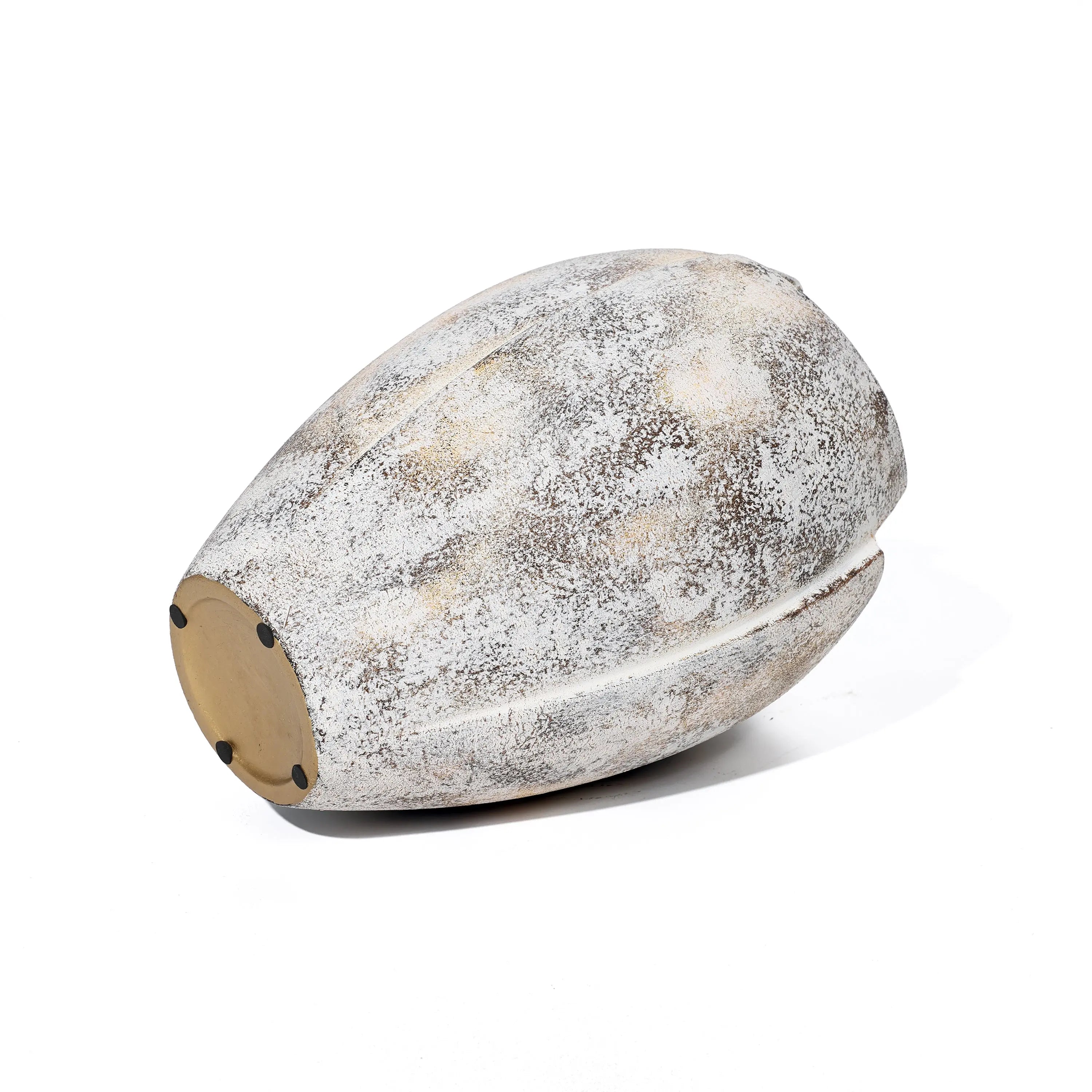 A textured, oval-shaped sculpture resembling a broken egg design features a speckled white and gray surface. Mounted on a flat wooden base, this decorative piece is elegantly displayed against a white background.