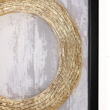 Close-up of a textured, gold metal design in a circular pattern on a gray and white abstract background, elegantly framed in black. Perfect for enhancing your home decor with sophisticated wall decor.
