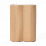 cylindrical-tan-colored-vase-with-a-white-top