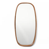 The LuxenHome Jean wood frame rounded rectangle wall mirror is mounted on a white wall. Its minimalist feel and simple, elegant design infuse a contemporary style into the decor.