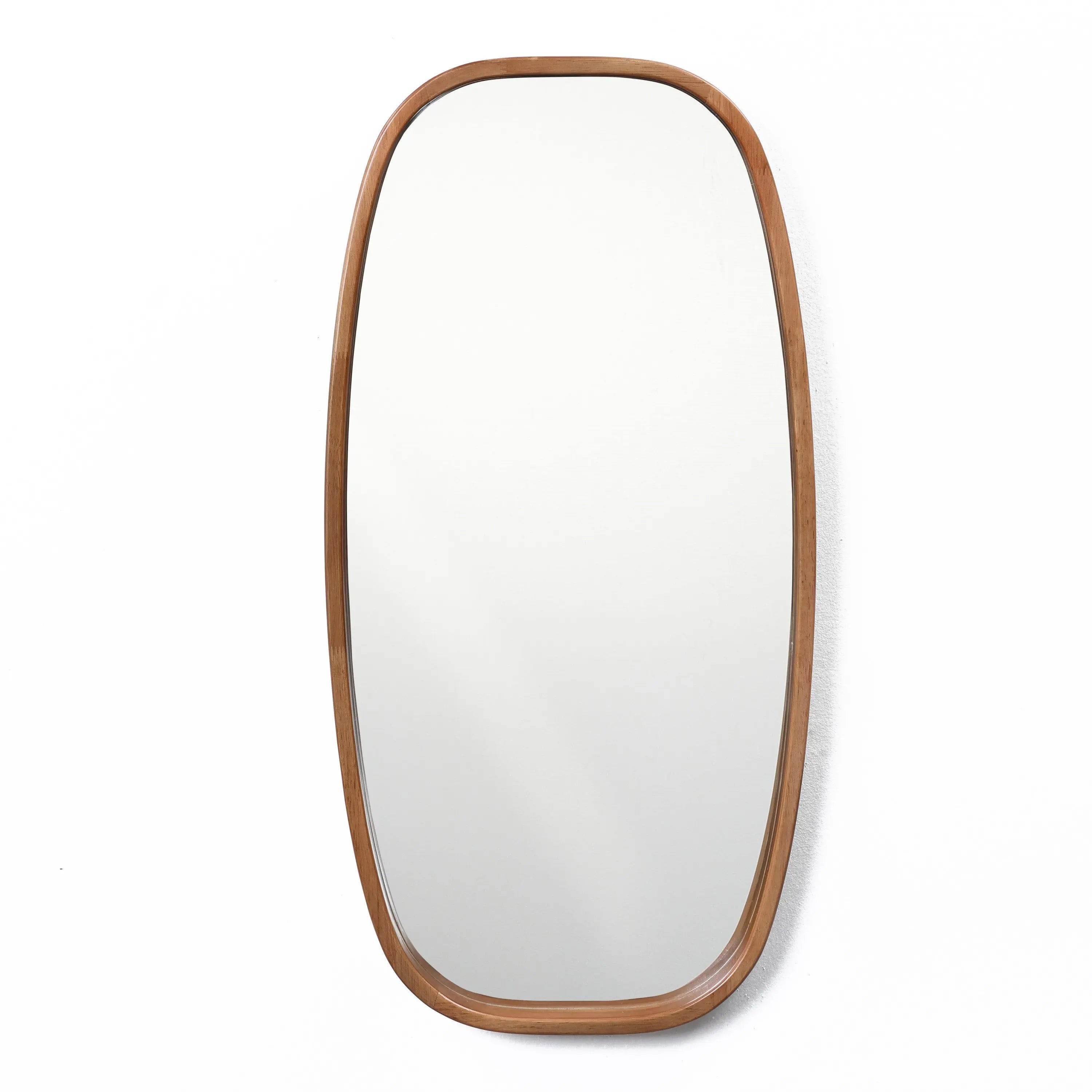 The LuxenHome Jean wood frame rounded rectangle wall mirror is mounted on a white wall. Its minimalist feel and simple, elegant design infuse a contemporary style into the decor.